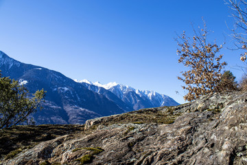 Fototapeta premium Alps mountain panoramic landscape on a rock