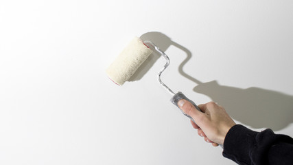 Roller painting white wall © Luca Rossatti