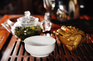 White tea bowl on the background of a tea table close-up. tea ceremony
