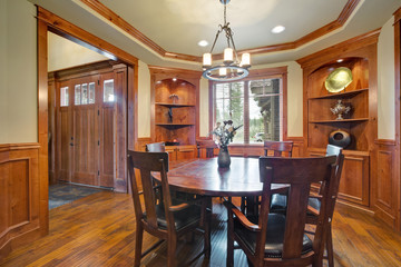 Elegant dining room with built-in shelves