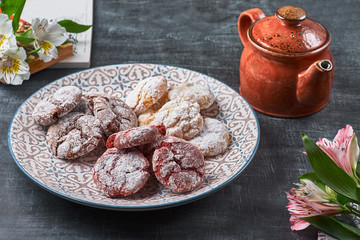 Chocolate 'Red velvet crinkles' cookies in powdered sugar