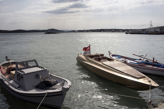 Modern and traditional boats at seaside of Cunda (Alibey) Island