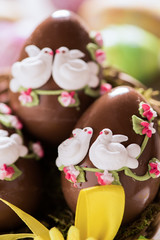Decorated Chocolate easter egg on wooden table