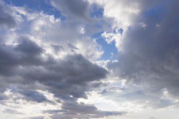 Fototapeta na wymiar Cloudy day on blue sky at evening