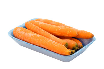 Carrots in blue retail package, isolated on white background with clipping path.