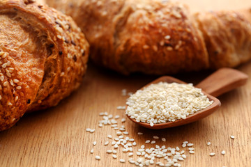 Closeup of tasty croissant with sesame seeds