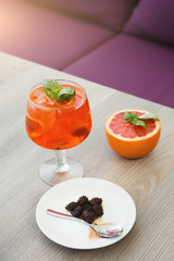 Modern serving of italian spritz with orange slices