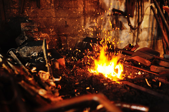 blacksmith tools in a hot oven close-up