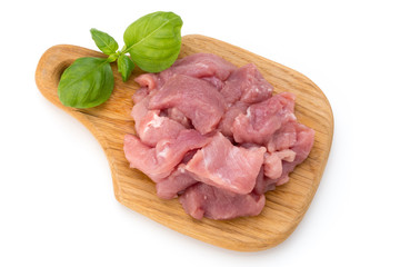 Raw chopped beef meat pieces isolated om white background cut out.