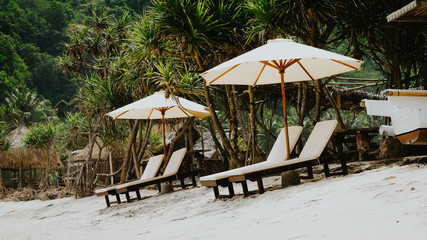Sunbed on White Sand under Palms - Atuh Beach, Nusa Penida, Bali, Indonesia