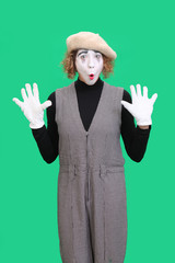 Performing mime isolated on green