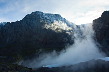 Beautifull valley with view to snow high mountains in sunlights