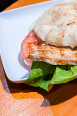 Cropped image of chicken burger
