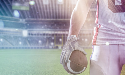 closeup American Football Player isolated on big modern stadium