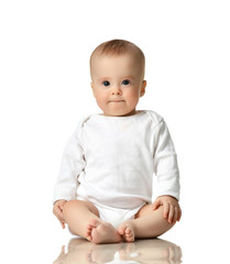 7 month infant child baby  girl toddler sitting in white shirt