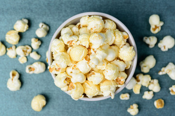 Caramel popcorn in a bowl, top view