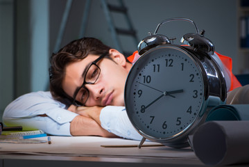 Sleeping architect after late long hours 