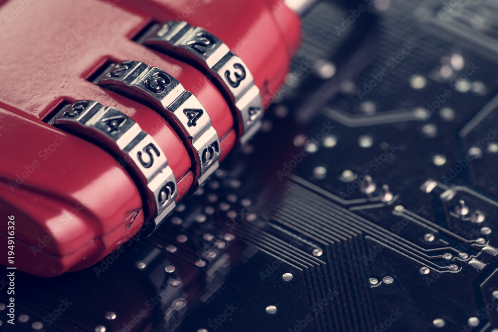 Wall mural code numbers on combination pad lock on computer circuit board with solder, digital cyber safety or 
