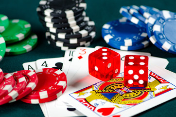 Chips and cards on casino table 