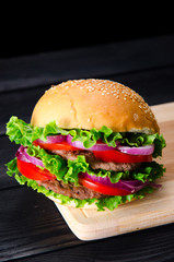 Burger served in bun in nutrition fast food concept