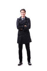 Young businessman wearing winter coat isolated on white