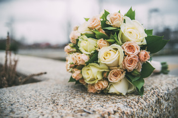 wedding flowers of yellow beige pink purple roses