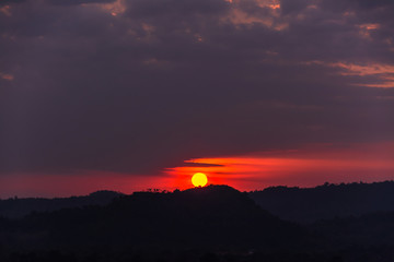 sunset over mountains or hills