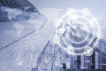 Man using smartphone and working on laptop computer