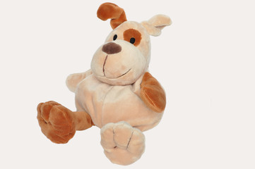 baby toy - spotted dog on a white background