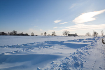 Fototapeta na wymiar Schneeverwehungen auf Rügen, Altkamp, Putbus