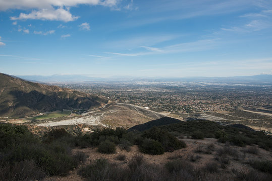 Fototapeta San Antonio Dam and View of the City of Claremont, Ontario, Upland, Rancho Cucamonga, Montclair, and Pomona from Potato Mountain, Mount Baldy, California