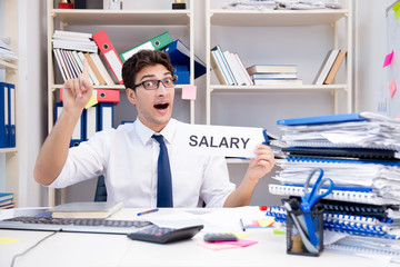 Busy frustrated businessman angry in the office