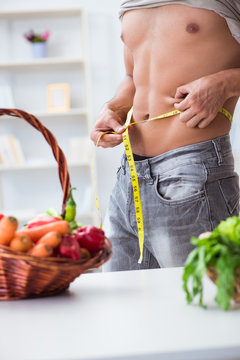 Young man in healthy eating and dieting concept