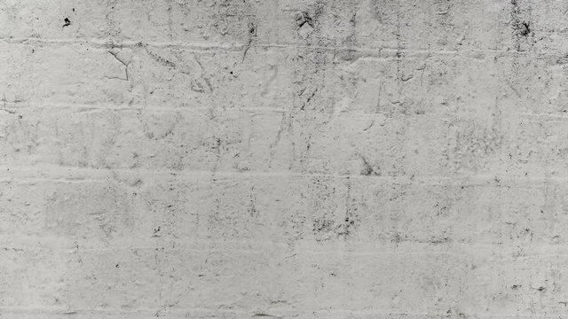 Cracked Paint on Brick Wall Texture. Animated loop for backgrounds or overlaying as foreground filters to grunge up titles, motion graphics, or give footage an old worn look.