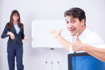 Business presentation in the office with man and woman