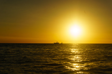 Fishermans at sunset