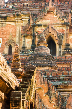 View of the facade of a building on a pagoda in Bagan, Myanmar. Close-up. Vertical.