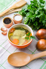 Fish soup served on the table in plate