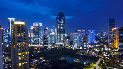 Naklejka premium Aerial night view of Jakarta cityscapes near Kuningan Central Business District.