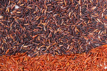 Heap of black and red rice as background, healthy, gluten free nutrition concept