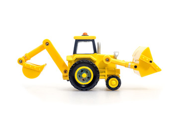 Obraz na płótnie Canvas Tractor with backhoe and loader toy isolated on white bacground . Children's Developmental, creative thinking toy car.