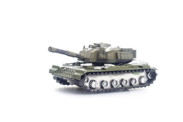 Fototapeta na wymiar military tank on a white background. Toy for children and adults.