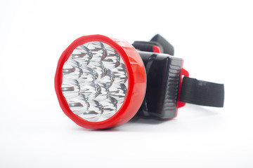 LED headlamp isolated on white background.