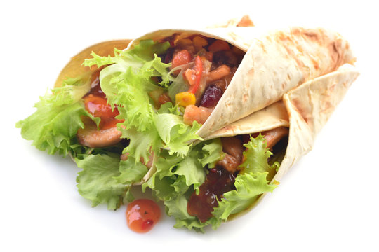 Mexican burrito with chicken and vegetables on a white background