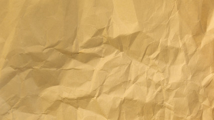 wrapping crumpled sheet of paper on a white background
