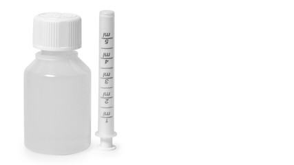 Bottles with medicine, nasal spray. Cough syrup, antipyretic syrup and nose drops on white background. Medication for cold treatment, copy space, template