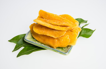 Fototapeta na wymiar Dried Mango or Dried Mango slices on a background.