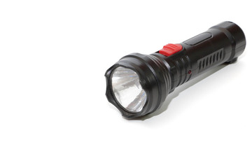 Isolated black flashlight on white background