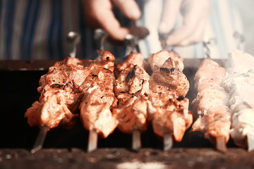meat on charcoal shish kebab grill smoke