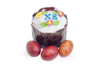 Easter cake and Easter eggs on a white background